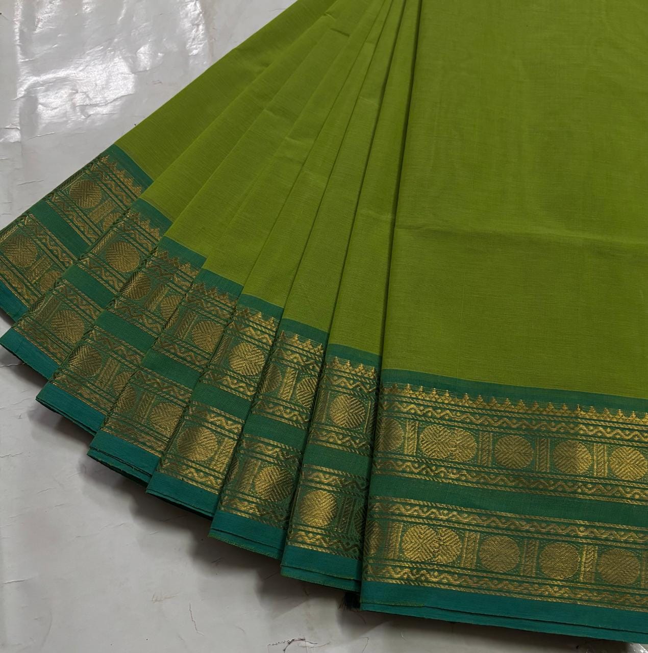 Parrot Green Kanchi Cotton Saree with Golden Zari Retta Petta Border and Running Blouse
